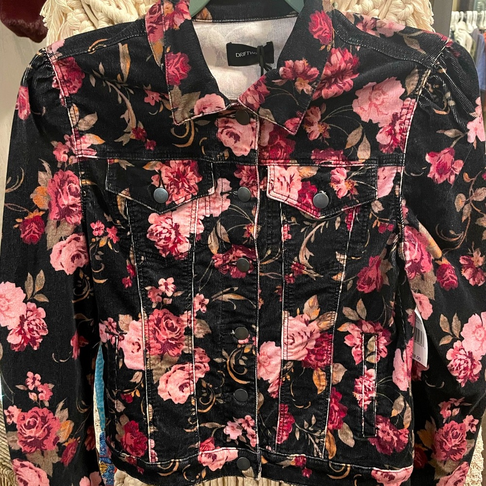 Driftwood corduroy jean jacket with floral print.